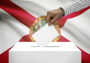 Voting concept - Ballot box with US state flag on background - Florida